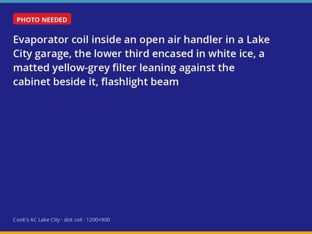 Ice-encased evaporator coil beside a clogged filter in a Lake City air handler