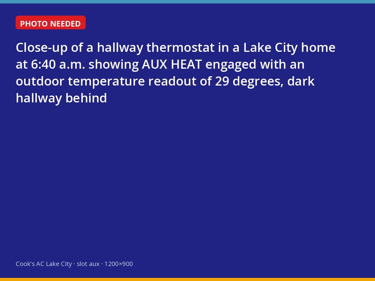 Thermostat showing auxiliary heat running on a 29-degree Lake City morning