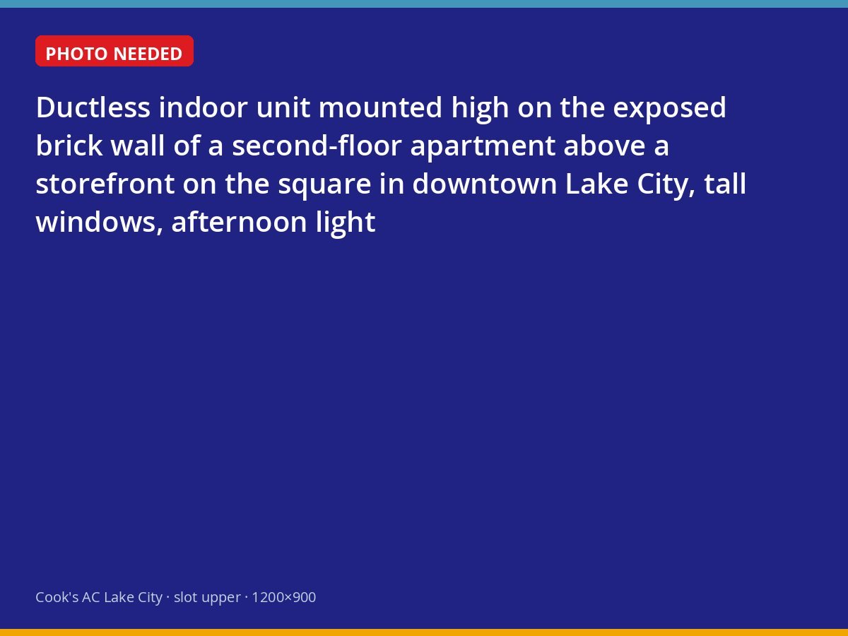 Ductless indoor unit on an exposed brick wall in a downtown Lake City upstairs apartment