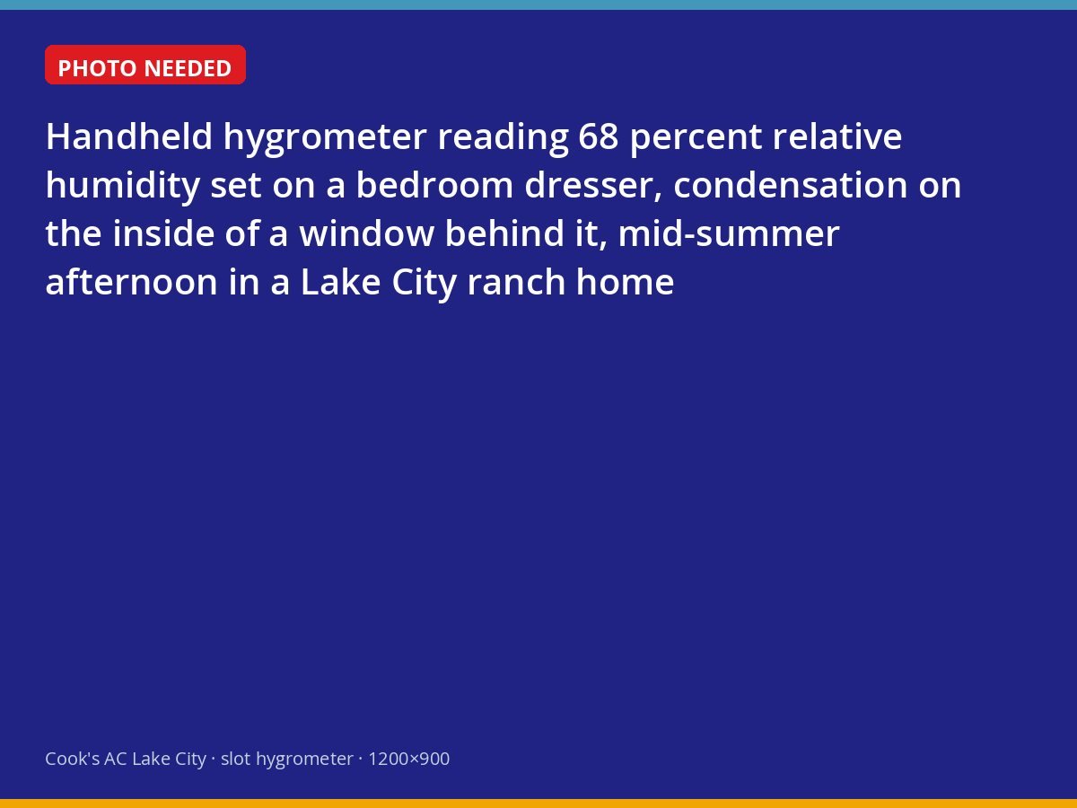 Hygrometer showing high indoor humidity in a Lake City bedroom